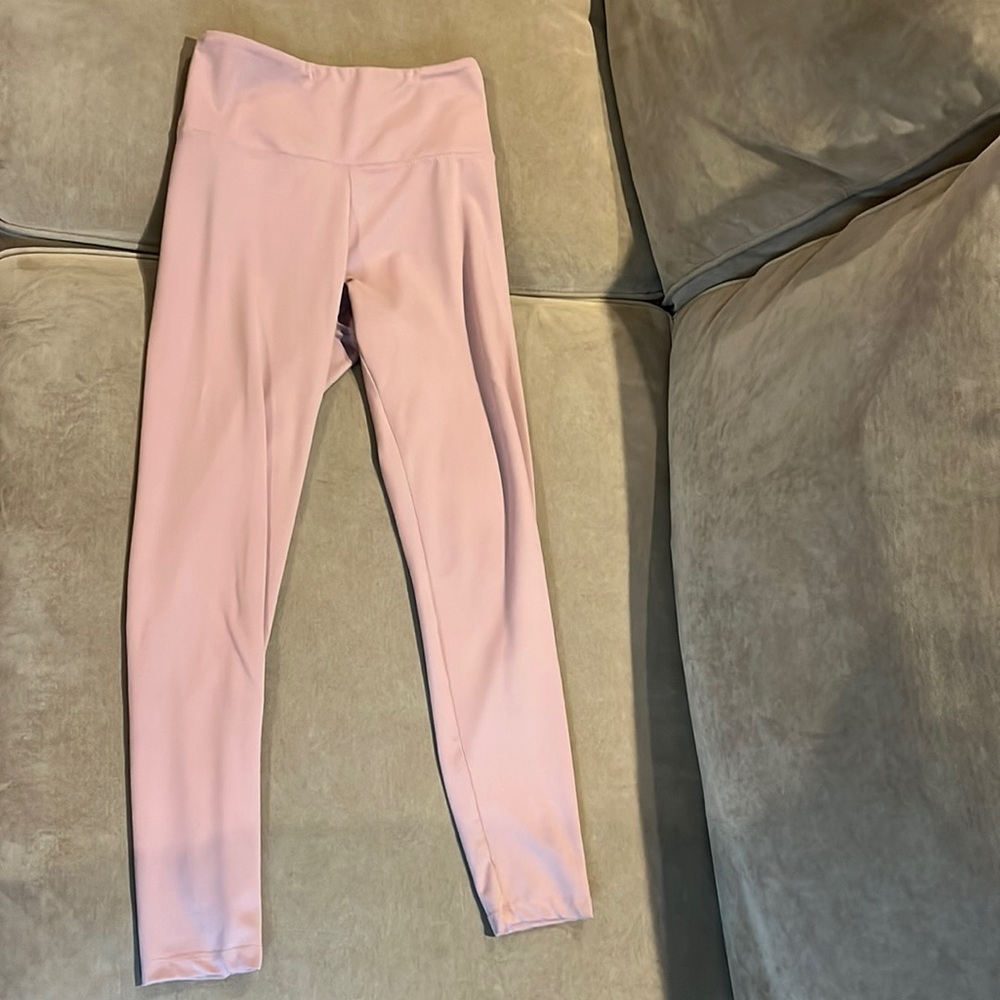 Soft light pink leggings in a small